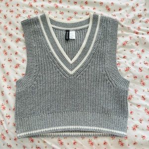 divided sweater vest